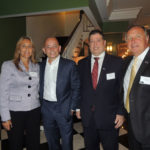 business professionals pose for picture at the Long Island Hospitality Association 2018 kick off meeting
