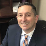 headshot of executive board member Michael Newman